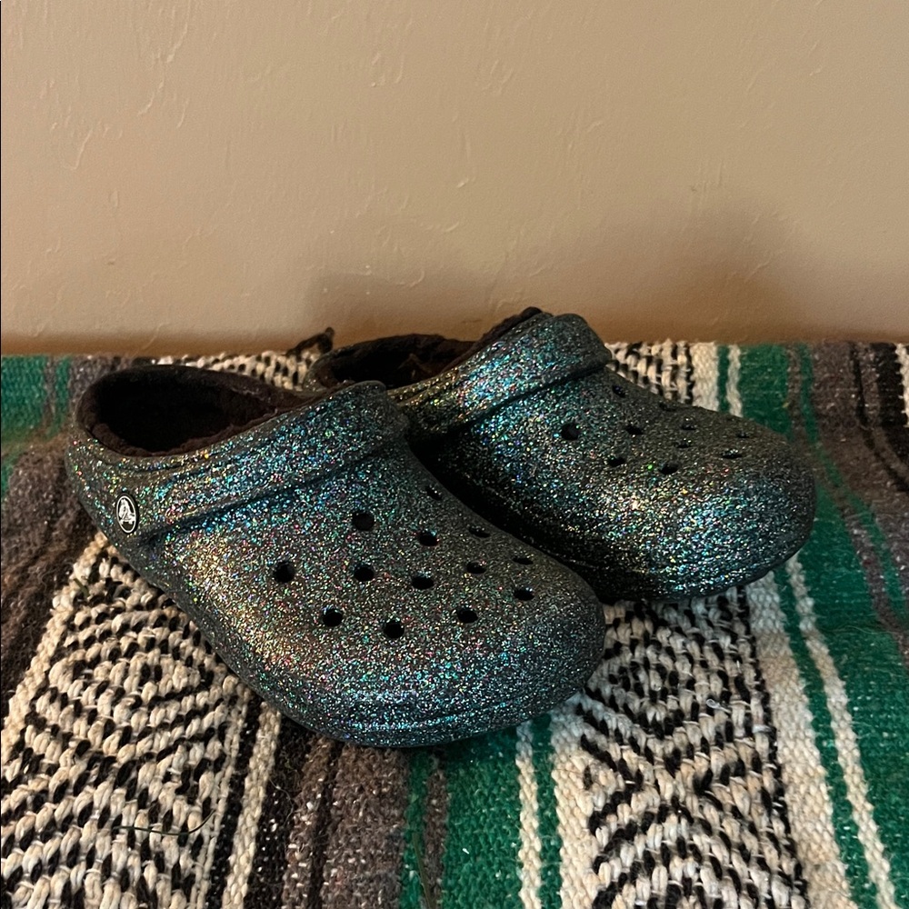 CROCS Sparkly green lined slip on shoes size 7